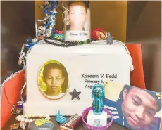  ?? APRIL GAMIZ/THE MORNING CALL ?? Kareem Fedd was shot to death in 2012 when he was 17 years old. His mother, Jeani Garcia, keeps a memorial to him in her home.