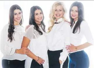  ?? PHOTOS: GRAHAM HUGHES ?? Jewelry designer Katherine Karambelas, second right, poses with her daughters, from left, Faith, Maria-Anna and Nektaria, at her home in Laval.
