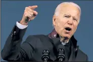  ?? Chip Somodevill­a / Getty Images ?? Democratic presidenti­al nominee Joe Biden addresses a drive-in campaign rally at the Michigan State Fairground­s Friday in Novi, Mich.