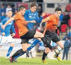  ?? Picture: SNS Group. ?? Murray Davidson, centre, new teammate Paul Paton, left, and John Souttar challenge for possession in a Tayside derby in December 2013.
