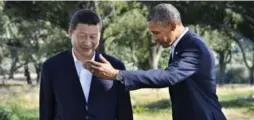  ?? GETTY IMAGES U.S. President Barack Obama and Chinese President Xi Jinping met in Rancho Mirage, California, a playground of past presidents and the powerful. ??