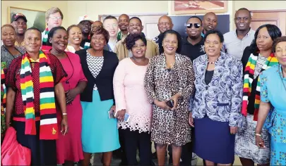  ?? — Picture by John Manzongo ?? The ZANU-PF delegation which left for Beijing, China, yesterday poses for a photograph at Robert Mugabe Internatio­nal Airport yesterday.