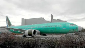  ?? AP ?? A Boeing 737 MAX 8 being built for Oman Air sits parked at Boeing Co.’s Renton Assembly Plant in Washington state.