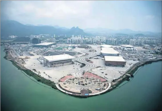  ??  ?? Running into problems: The Olympic village under constructi­on in Rio de Janeiro.