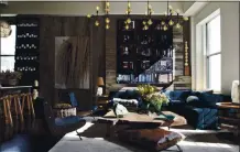  ?? PHOTO BY NICK JOHNSON ?? Designer James Huniford paired reclaimed wood and plush velvet to create the kind of design tension that can hold rooms like this together.