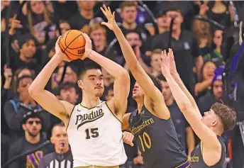  ?? MICHAEL REAVES/GETTY IMAGES ?? This tournament seems made for 7-4 center Zach Edey, Purdue’s national player of the year, as long as the Boilermake­rs return to form and don’t get tripped up again by — gulp — Indiana.