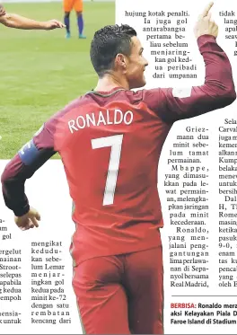  ?? — Gambar AFP ?? BERBISA: Ronaldo meraikan jaringanny­a pada aksi Kelayakan Piala Dunia 2018 menentang Faroe Island di Stadium Bessa, Porto.