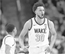  ?? LYNN HEY/AP ?? Wake Forest center Olivier Sarr reacts during his team’s upset of Duke on Tuesday night in Winston-Salem, North Carolina.