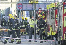  ?? AFP ?? Members of the emergency services outside the Parsons Green Tube station in west London on Friday.