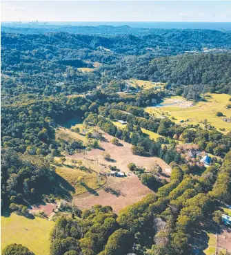  ??  ?? The 41.36ha landholdin­g (foreground) at 1030 Currumbin Creek Rd has sold for $3.175 million.
