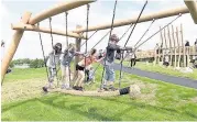  ??  ?? Pulling together Children raced to try out the new attraction at its open day