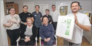  ?? Photograph: Iain Ferguson, alba.photos ?? Staff and residents of Moss Park celebrate their catering award.