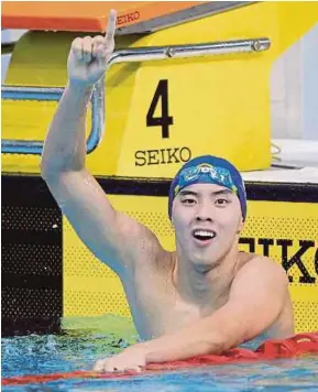  ??  ?? Welson Sim clocked 3:48.93s in the 400m freestyle at the National Aquatics Centre in Beijing yesterday.