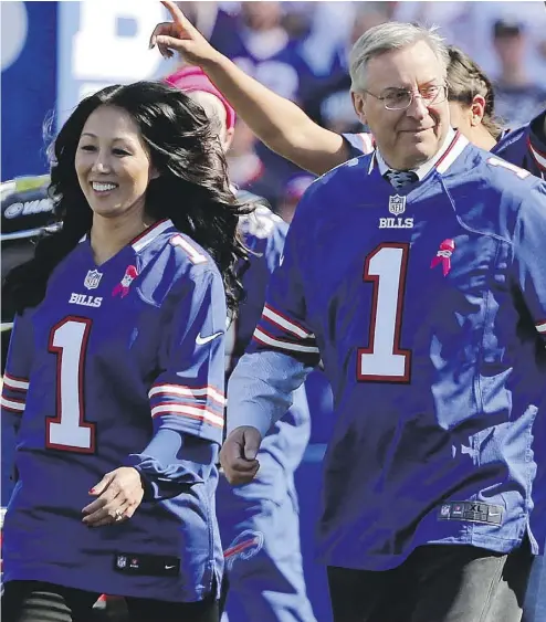  ?? MIKE GROLL / THE ASSOCIATED PRESS FILES ?? Buffalo Bills’ new owners Kim and Terry Pegula were saluted when they bought the franchise. However, the managerial fiasco in the hiring and firing of head coach Rex Ryan has cast some doubt on their ownership acumen.