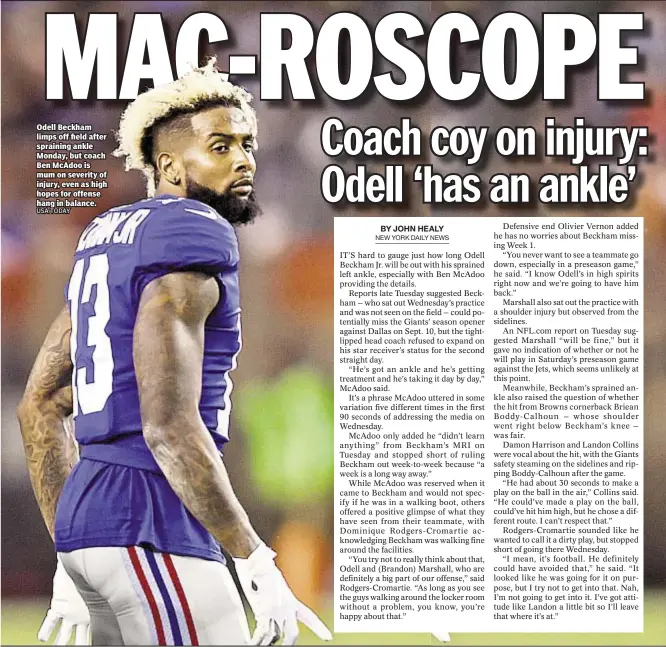  ??  ?? Odell Beckham limps off field after spraining ankle Monday, but coach Ben McAdoo is mum on severity of injury, even as high hopes for offense hang in balance.