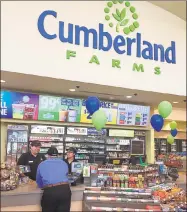  ?? Chris Bosak / Hearst Connecticu­t Media ?? Cumberland Farms employees talk in the redesigned store in New Milford on Thursday.