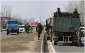  ?? — H.U. NAQASH ?? Security forces at the shootout scene at Lawaypora, near Srinagar, on Wednesday.