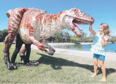  ?? Picture: RICHARD GOSLING ?? Abby Coetzee, 5, is a big fan of The Gold Coast Arts Centre’s dinosaur show.