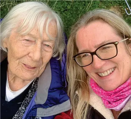  ??  ?? The comfort of cuddling: Sarah Jackson with her mother Mary, 93, before she went into a home