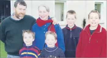  ??  ?? The Treacy family from Castletown­roche checking the facilities at Nagle Rice Secondary School, Doneraile, during the open day in 2000 - pictured are Mary and Simon, with their children Ciaran, Cathal, Eamonn and Ruairi.