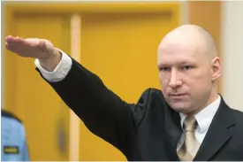  ?? — AFP ?? Norwegian mass killer Anders Behring Breivik making a Nazi salute.