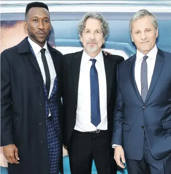  ?? JAMIE MCCARTHY/GETTY IMAGES ?? Writer-director Peter Farrelly, centre, says his two stars Mahershala Ali, left, and Viggo Mortensen “elevated” the comedic moments in the new film Green Book.