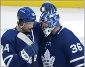  ?? FRANK GUNN— THE CANADIAN PRESS VIA AP ?? Toronto's Auston Matthews, left, had two goals and an assist, and goalie Jack Campbell earned a shutout in Game 1.