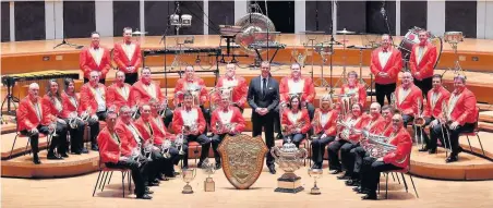  ?? WWW.GOLDY.UK ?? Cory Band with musical director Philip Harper