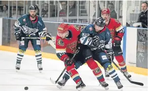  ??  ?? Stars Jimmy Jensen, who was making his home debut, tussles for possession with Capitals’ Dylan Anderson.