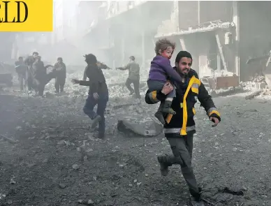  ?? ABDULMONAM EASSA / AFP / GETTY IMAGES ?? A man rescues an infant after a bombing raid on the outskirts of the Syrian capital Damascus on Sunday. At least 71 people were killed and more than 300 were injured in 24 hours of intense bombing in eastern Ghouta, observers said.