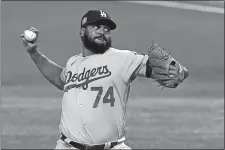 ?? TONY GUTIERREZ/ AP PHOTO ?? Los Angeles Dodgers relief pitcher Kenley Jansen throws against the Tampa Bay Rays during the ninth inning in Game 3 of the World Series on Friday in Arlington, Texas.