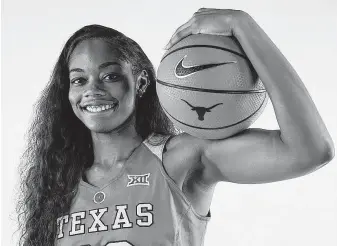  ?? Courtesy Texas Athletics ?? Barbers Hill product Charli Collier looks right at home in burnt orange, scoring 21 points in a recent exhibition game. “Charli’s going to be an impact player for us,” coach Karen Aston says.