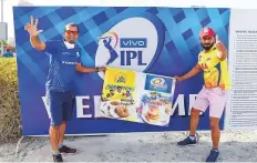  ?? Virendra Saklani/Gulf News ?? Chennai fan John Thoras and Mumbai fan Praveen Saldanha all set to watch their teams play in Dubai yesterday.