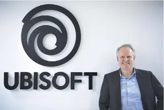  ?? AFP ?? CEO of French video game publisher Ubisoft, Yves Guillemot, poses during a photo session at the Ubisoft headquarte­rs in Montreuil, outside Paris, on April 5.