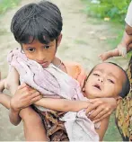  ?? Picture: REUTERS/HANNAH MCKAY ?? NO HOME: Rohingya refugees continue on their way after crossing from Myanmar into Palong Khali, Bangladesh