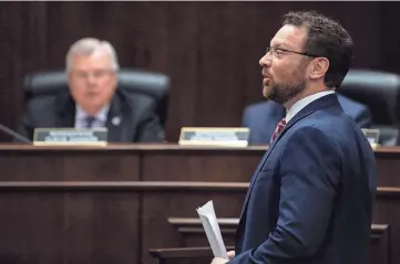  ?? NICOLE HESTER/THE TENNESSEAN ?? Rep. Jason Zachary, R- Knoxville, has a heated exchange with Rep. Vincent Dixie D- Nashville, at Cordell Hull State Office Building in Nashville on March 12.