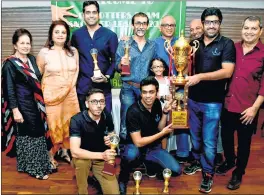  ??  ?? The victorious Otters ‘Rockets’ players, Zenul Arsiwala, Rishabh Thakkar, Abhimanyu Gandhi, Nabil Lakdawala and Angad Bhatty hold aloft the Champions Trophy with Vikram Rao, Neeraj Maheshwari and other members.