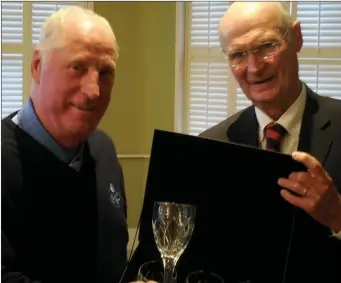  ??  ?? Tony Hayes, runner-up in the 2018 Presidents Prize at County Louth Golf Club, is congratula­ted by Club President Neil Matthews.