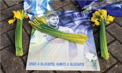  ??  ?? Flowers and scarves placed outside Cardiff City’s stadium in tribute to Emiliano Sala. Photograph: Mark Kerton/PA