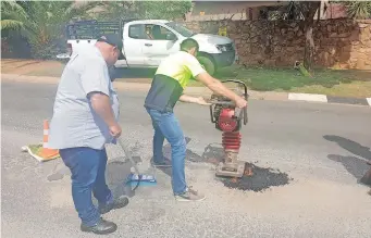  ??  ?? PANORAMA residents have taken to filling their own potholes at their expense.