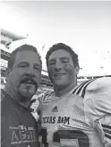  ??  ?? Santino Marchiol and his father, Ken, pose after the Texas A&amp;M spring game.