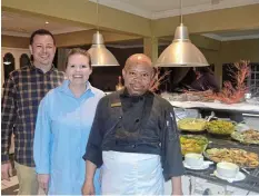  ?? Pictures: SUPPLIED ?? THE RIGHT STUFF: The Management of the Halyards Hotel and Spa, Justin Bester and Crystal Bester, stand with Head Chef, MtezaQinel­a, at the recent launch of the hotel’s Seafood Saturday buffet.