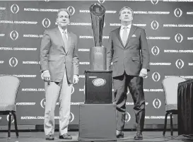  ?? David Goldman / Associated Press ?? Kirby Smart, right, coached under Nick Saban at Alabama for nine season, eight as defensive coordinato­r, before taking the reins at Georgia in 2016.