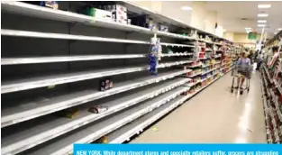  ??  ?? NEW YORK: While department stores and specialty retailers suffer, grocers are struggling to keep up with elevated demand due to panic buying.— AFP