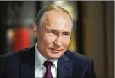  ?? ALEXEI DRUZHININ/SPUTNIK ?? Russian President Vladimir Putin told NBC News he “couldn’t care less” if Russians attempted to meddle in the election and said he would never extradite those charged to the U.S.