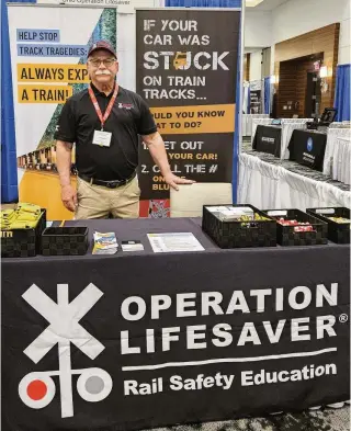  ?? CONTRIBUTE­D ?? Alan Stouder, state coordinato­r for Ohio Operation Lifesaver, works at the group’s booth at the 2024 Ohio Associatio­n of Chiefs of Police conference held in Columbus. “People need to make good safe decisions,” Stouder said.