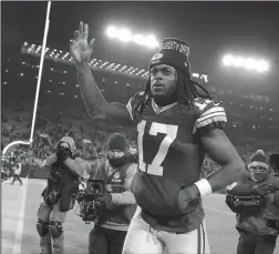  ?? STACY REVERE/GETTY IMAGES ?? Then-Packers wide receiver Davante Adams walks off the field after the Packers defeated the Vikings on Jan. 2 in Green Bay, Wis.