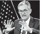  ?? SUSAN WALSH/AP ?? Federal Reserve Chairman Jerome Powell focuses on the rate cut at a news conference Wednesday in Washington.