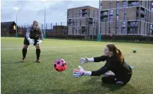  ?? ?? Ros Barrie is the captain of the new team, and below, the players during training at Dalmarnock