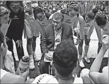  ?? [JESSICA HILL/THE ASSOCIATED PRESS] ?? Connecticu­t coach Geno Auriemma talks to his team during the Huskies’ 88-64 victory over Oklahoma. NO. 17 OKLAHOMA 105, NORTHWESTE­RN STATE 68: